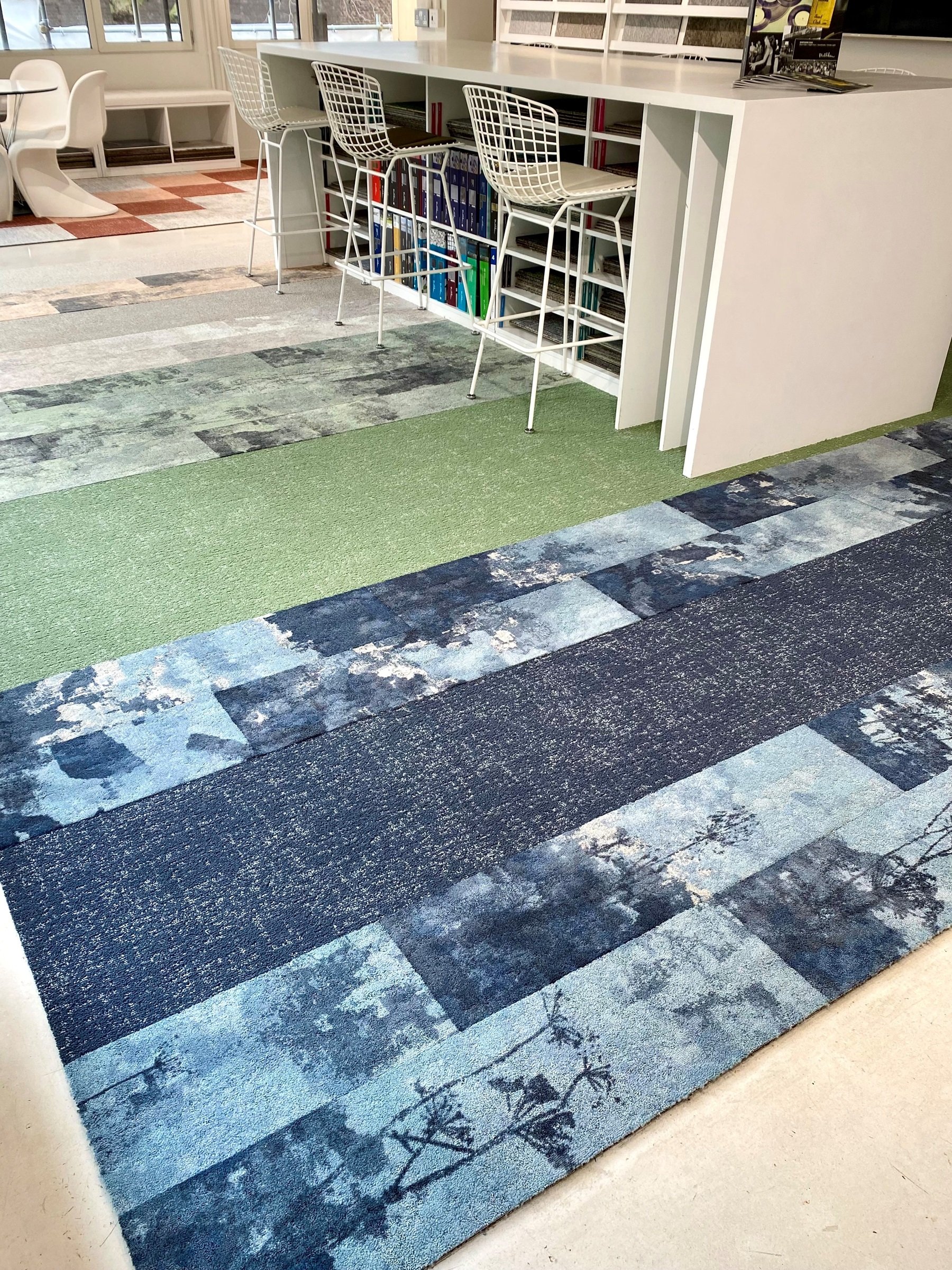Milliken's London showroom with coloured carpet tiles with nature motifs 