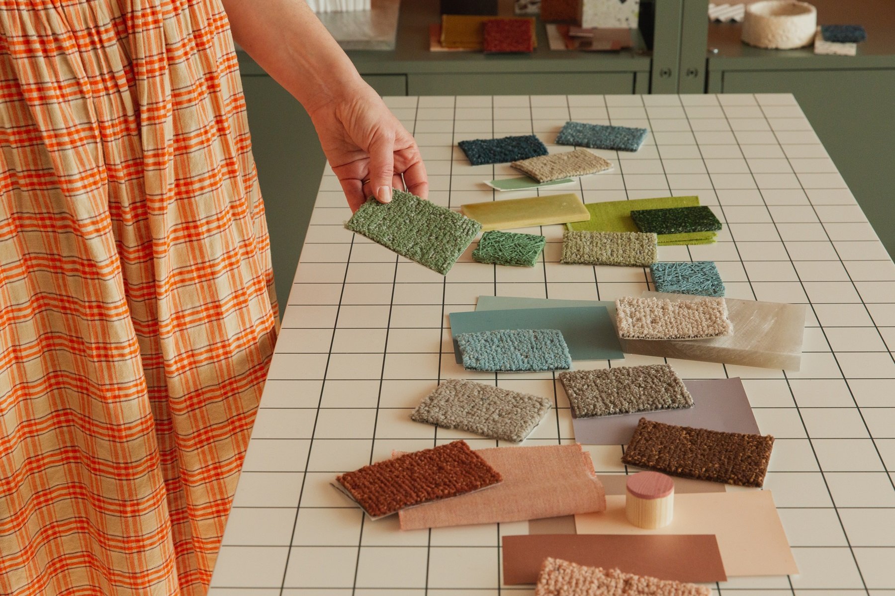 Different coloured carpet tile samples in Laura Perryman's studio